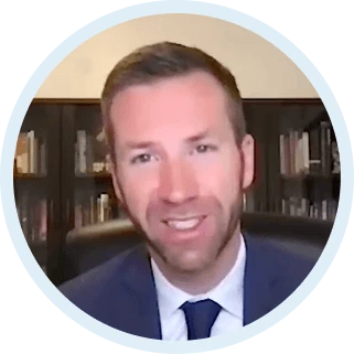 Photograph of John Ryan smiling