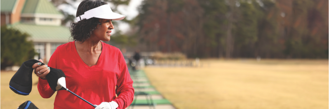 Peggy, a woman with PAH, living a healthy lifestyle playing golf
