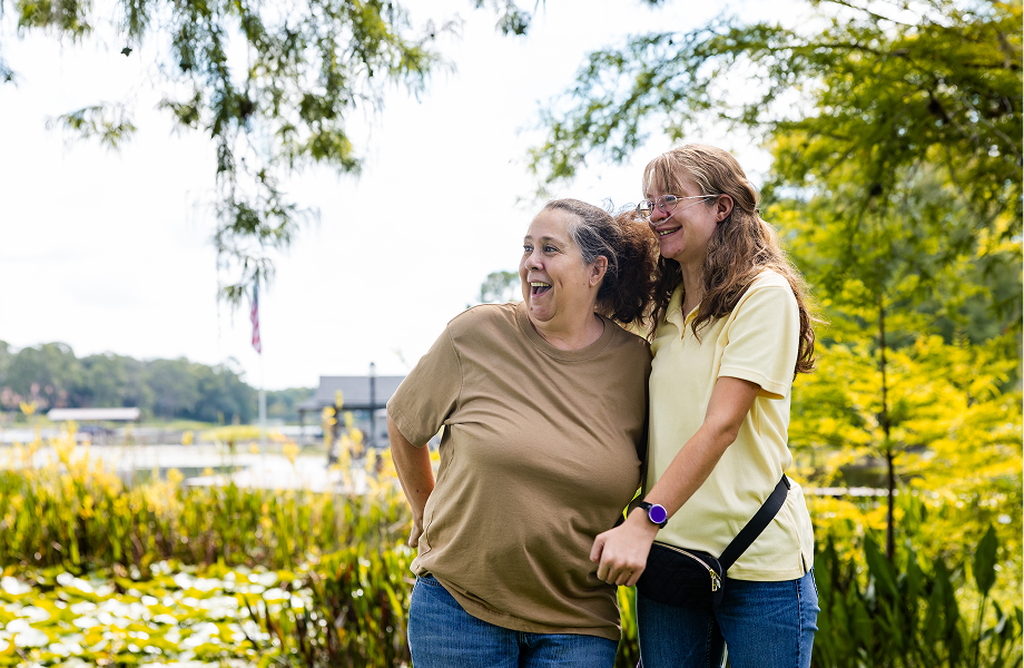 Jane and Nicole smiling outdoors