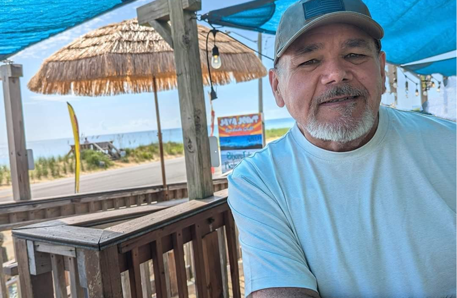 Mike smiling at the beach